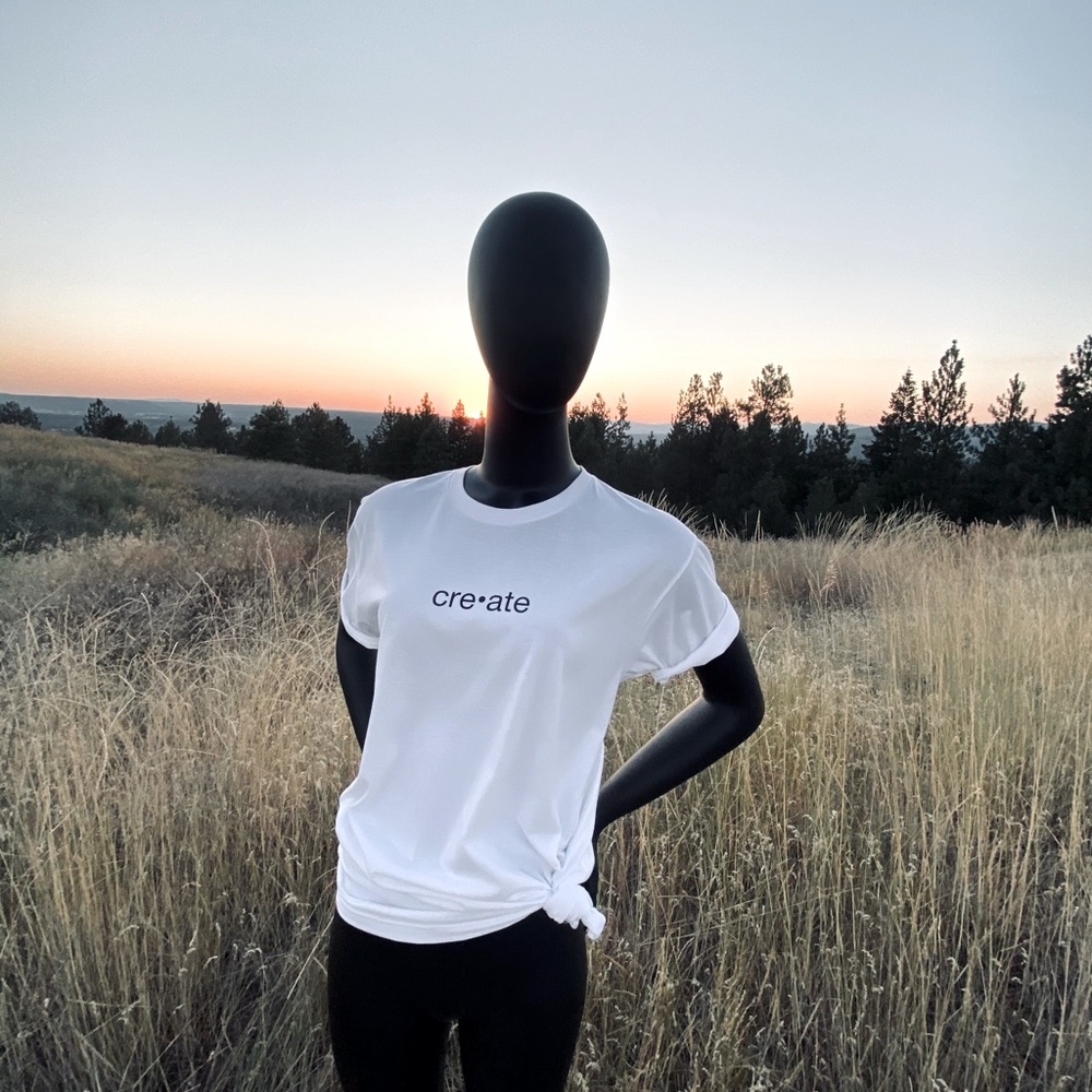 Soft white custom design tshirt saying “Create”